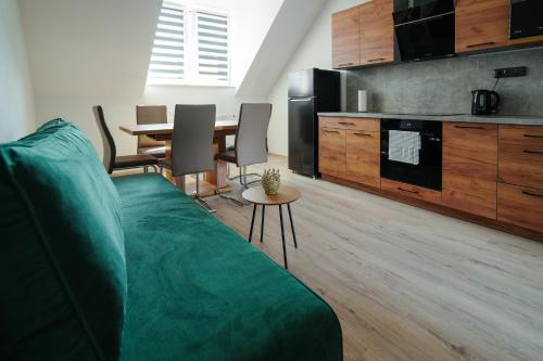 Kuchyň nebo kuchyňský kout v ubytování Enjoy apartments