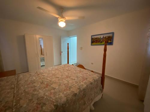 Postel nebo postele na pokoji v ubytování 1BR Suite at Villa Costa Verde near Playa Cofresi, Puerto Plata, with a pool, balcony and a rooftop terrace