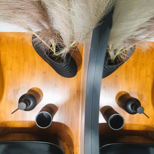 a close up of a wooden guitar with speakers at nisaki rooms & apartments in Methana