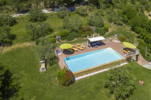 The swimming pool at or close to Casale Vittoria - Happy Rentals