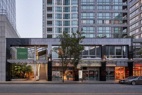 Carmana Hotel & Suites Image