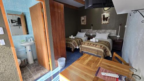 Cama o camas de una habitación en Hostal Pablito