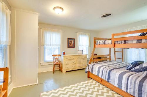 a bedroom with a bunk bed and a dresser at Prime Lakeside Village Location Apt with Kitchen! in Bemus Point