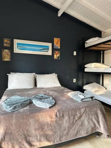 Katil atau katil-katil dalam bilik di Gurú Hostel Buzios