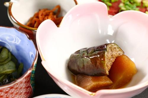 a heart shaped bowl of food with a doughnut in it at 富士見山荘 in Izu