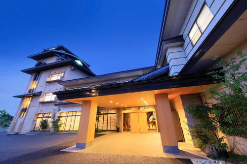 an exterior view of a building at night at Shouhakutei Azumaso in Tendo