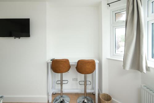 Televisyen dan/atau pusat hiburan di Private room in Modern and Stylish House