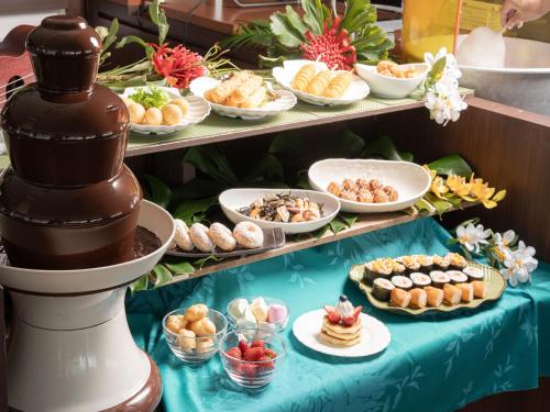 a buffet of food and desserts on a table at Shimoda Prince Hotel in Shimoda