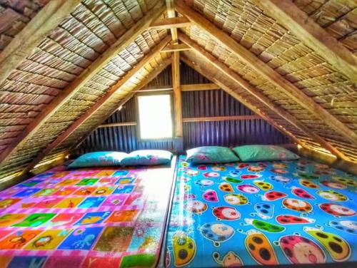 Postel nebo postele na pokoji v ubytování Itbayat House - Mahatao Island