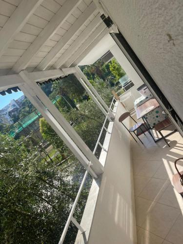 an overhead view of a room with windows and chairs at Tirana Perla in Sauk