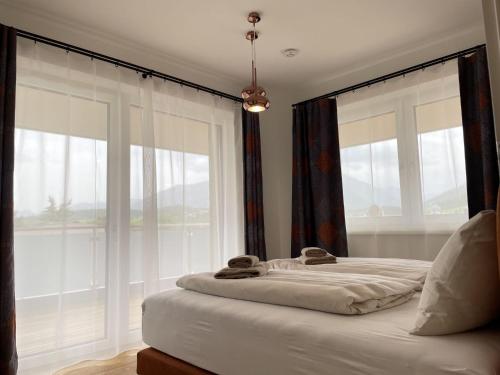 Krevet ili kreveti u jedinici u okviru objekta Local View Apartment - by myNests