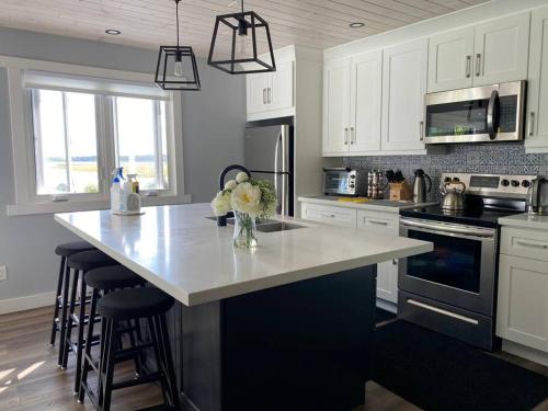 Η κουζίνα ή μικρή κουζίνα στο Sunrise net cottage