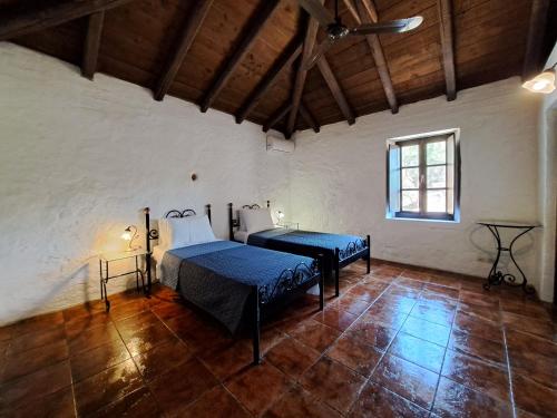 Ένα ή περισσότερα κρεβάτια σε δωμάτιο στο Tsivouli Accommodation