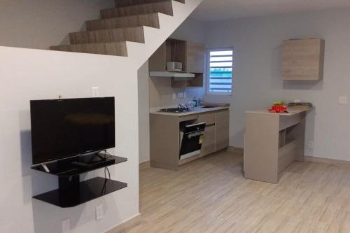 Kuchyň nebo kuchyňský kout v ubytování Casa Bon Bon dushi in popo resort Abrahamsz