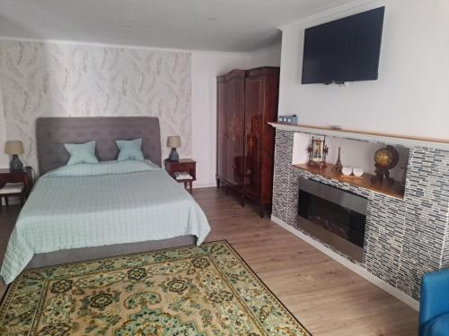 Ένα ή περισσότερα κρεβάτια σε δωμάτιο στο Casa Do Cais