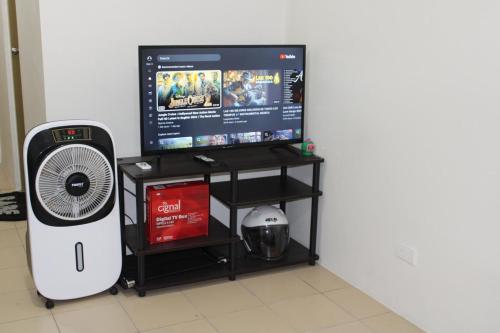 TV a/nebo společenská místnost v ubytování 8 Spatial Condo Unit