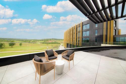 a view from the balcony of a building at Hotel du Bois d'Arlon in Arlon