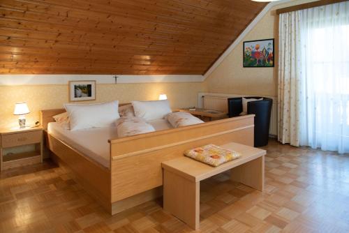 Postel nebo postele na pokoji v ubytování Bauernhof Flucher-Plaschg