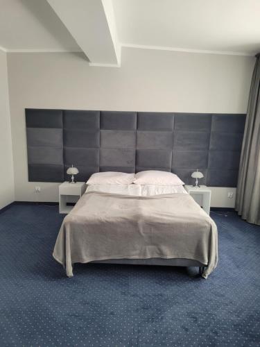 Ένα ή περισσότερα κρεβάτια σε δωμάτιο στο Hotel Park