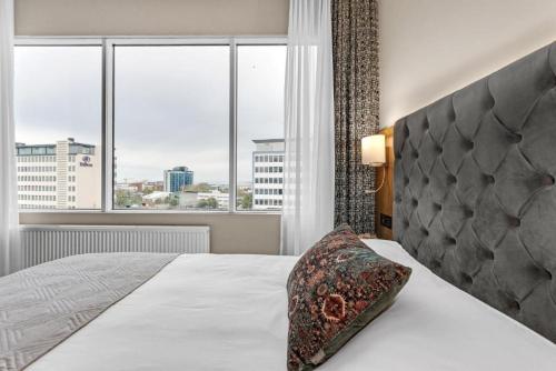 Postel nebo postele na pokoji v ubytování Hotel Muli