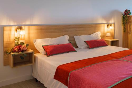 Luxury Singular Apartments Orangeにあるベッド