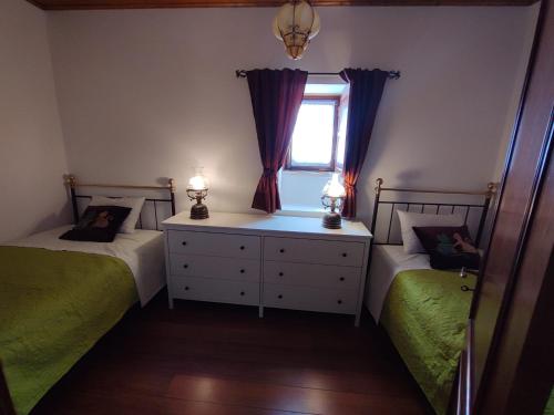 Ένα ή περισσότερα κρεβάτια σε δωμάτιο στο Casa Cantelas
