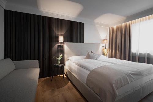 Postel nebo postele na pokoji v ubytování Hotel Schachner