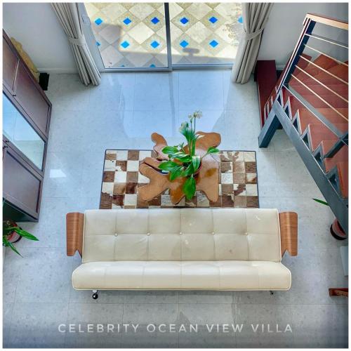 an overhead view of a living room with a white couch at Celebrity Ocean View Villa Samui in Bang Rak Beach