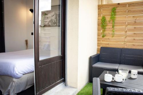 Postel nebo postele na pokoji v ubytování Le Captain Lodge