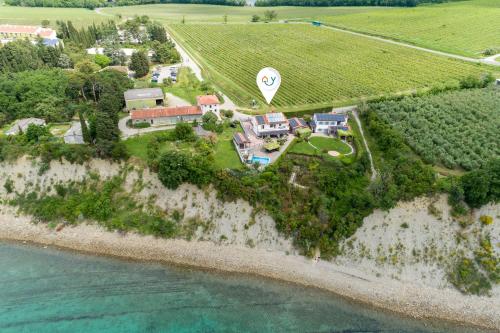 an aerial view of a home with a hot air balloon at Debeli Rtič Apartments in Ankaran