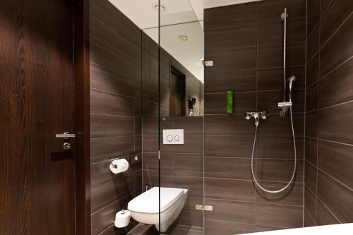 Koupelna v ubytování Tobbaccon Hotel