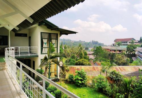 a view from the balcony of a house at Hotel Grand Astoeti in Kopo 2