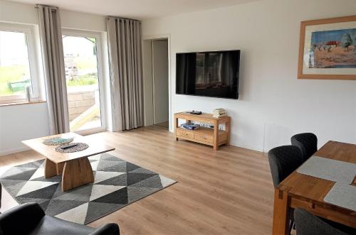 Μια τηλεόραση ή/και κέντρο ψυχαγωγίας στο Ferienhaus Egger