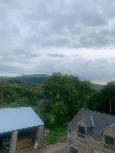 an overhead view of a house and a barn at Ekerveley Lodge in Ballyvoy