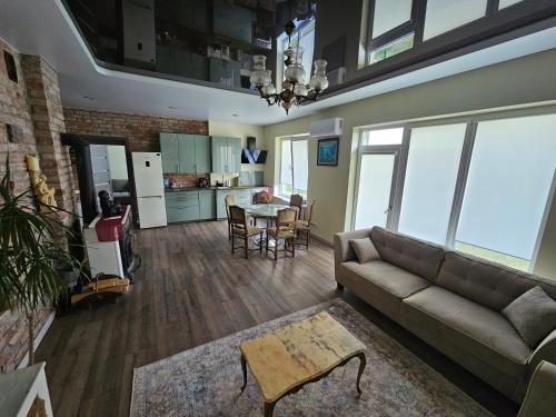 Η κουζίνα ή μικρή κουζίνα στο Apartamentai keliaujantiems į Kauna