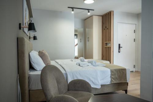 Postel nebo postele na pokoji v ubytování Hotel CENTRAL