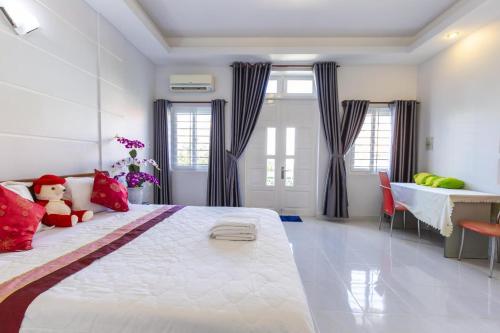 Ένα ή περισσότερα κρεβάτια σε δωμάτιο στο Hoàng My Villa - Bãi Sau - 5 phòng ngủ 9 giường - Free karaoke