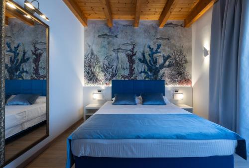 Postel nebo postele na pokoji v ubytování Hotel Villa Angelina