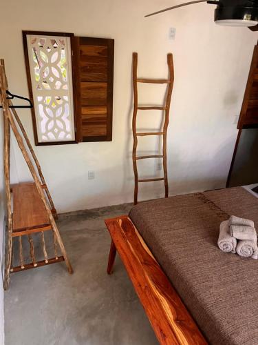 Ένα ή περισσότερα κρεβάτια σε δωμάτιο στο Casa Socó Guriu