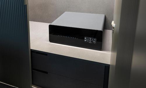 a microwave sitting on top of a counter at Zeta Rentals in Bari