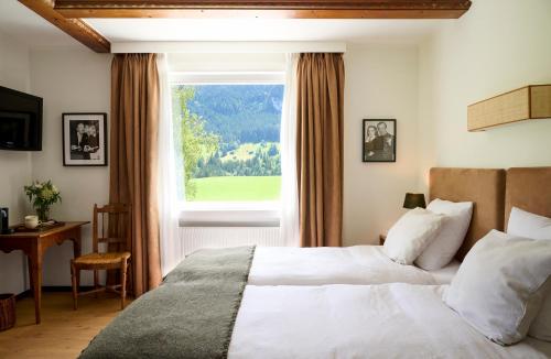 Postel nebo postele na pokoji v ubytování Maison d'hôtes Ermitage