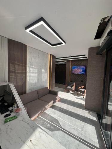 Μια τηλεόραση ή/και κέντρο ψυχαγωγίας στο Luxury Life Suites