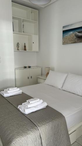 Postel nebo postele na pokoji v ubytování Alice Apartment
