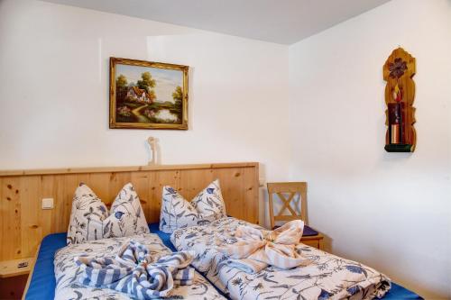 Ένα ή περισσότερα κρεβάτια σε δωμάτιο στο Ferienwohnung Lapislazuli