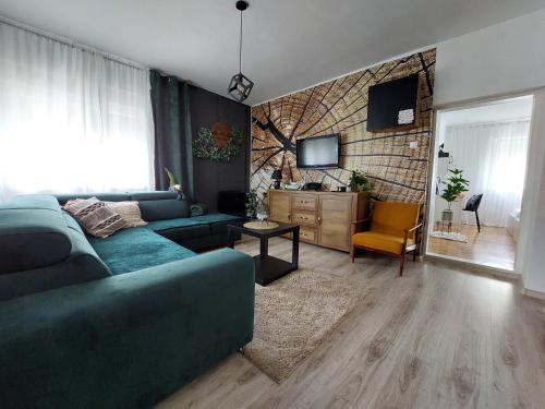 TV a/nebo společenská místnost v ubytování Kuća za odmor Alea Rustica Daruvar