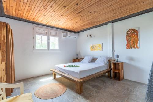 Postel nebo postele na pokoji v ubytování Bel'Eden Résidence