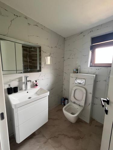 Koupelna v ubytování Apartman EM