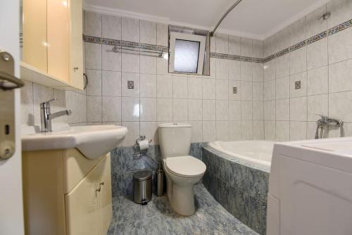 Koupelna v ubytování Aqua View Apartment