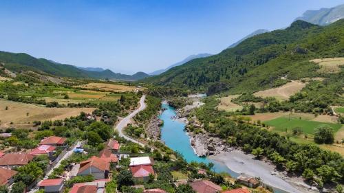 an aerial view of a river in a valley at Guesthouse Lumo, Entire Lodge swimming pool in Përmet