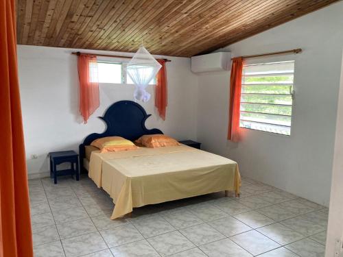Postel nebo postele na pokoji v ubytování location appartement " les pas d'Amé"